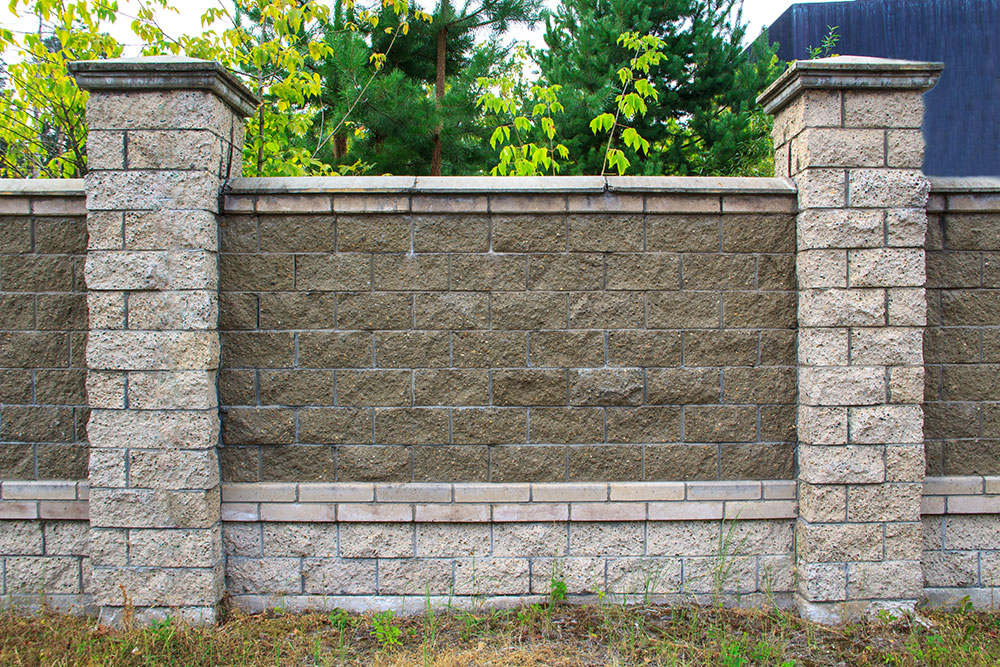 repaired concrete fence